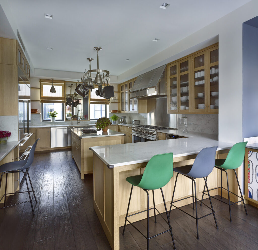 The custom home building process on display in a custom-built kitchen in a penthouse