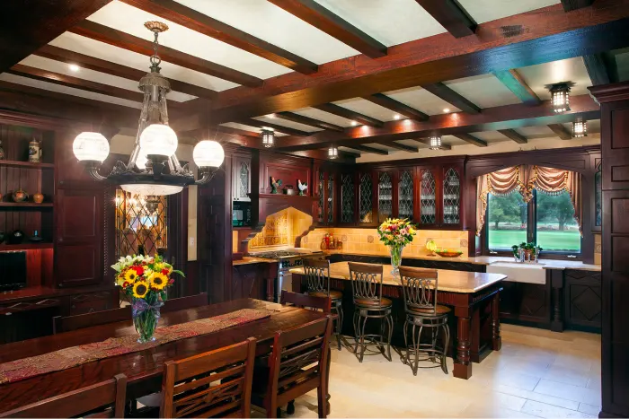 An image of stained cabinets and oak cabinets in a kitchen