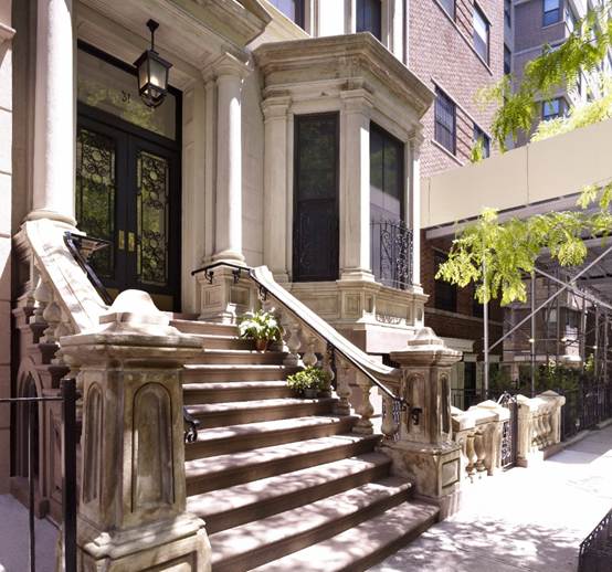 A picture of Romanesque columns on an exterior design of a property preservation in Midtown East in New York City