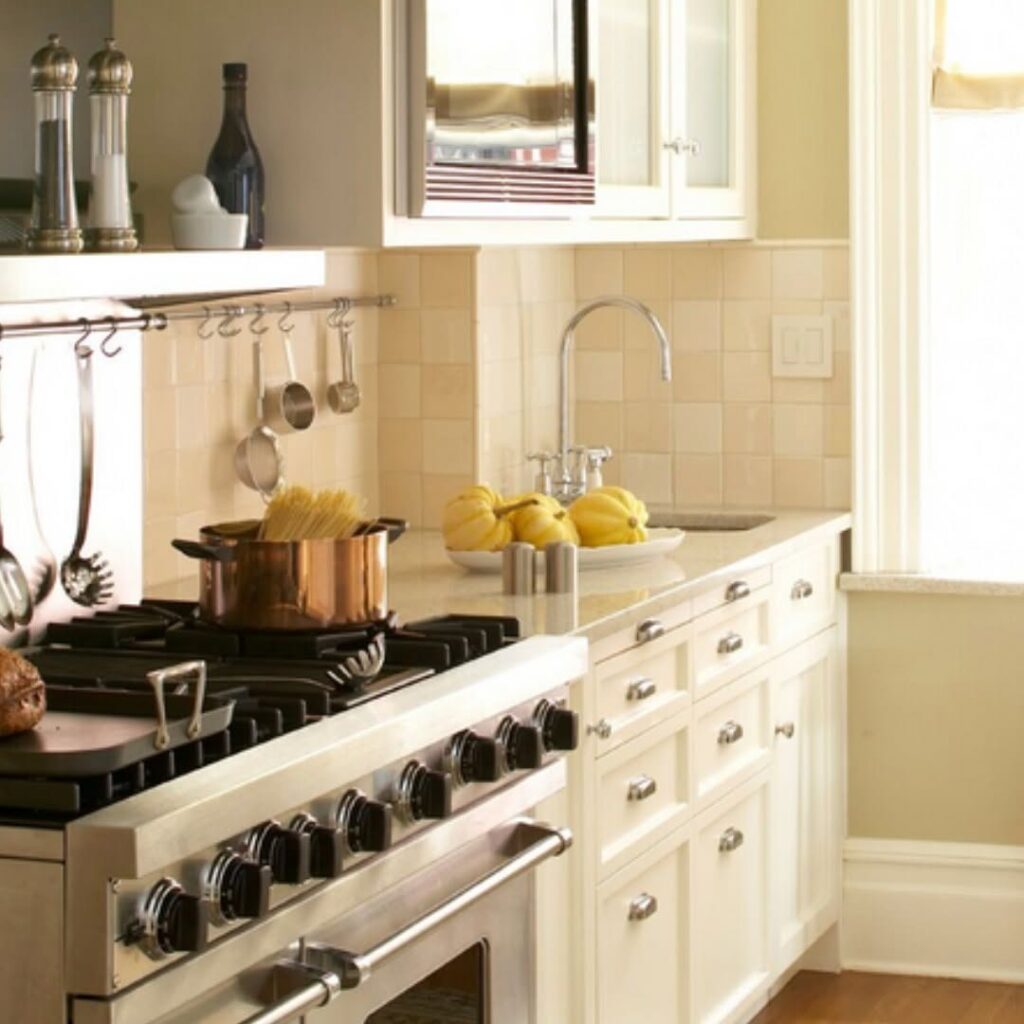 White-painted and stained oak cabinets in a kitchen
